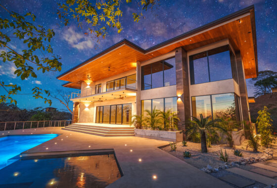 guanacaste real estate showing the front of the home in el palacete with sunset and stars in the background