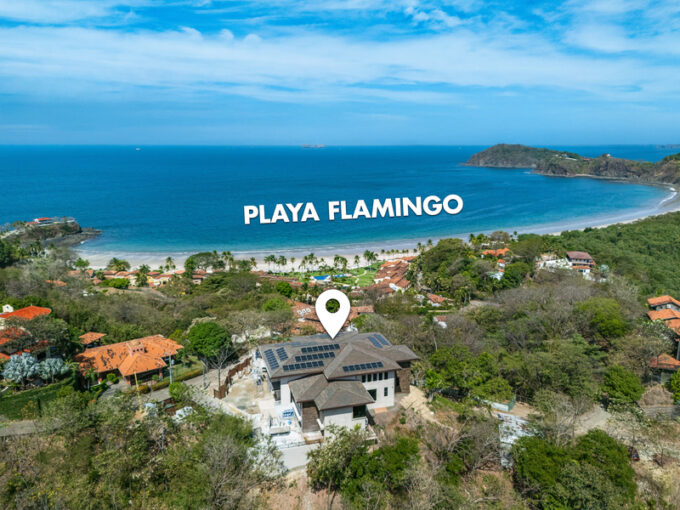 guanacaste real estate in playa flamingo showing luxury home by beach