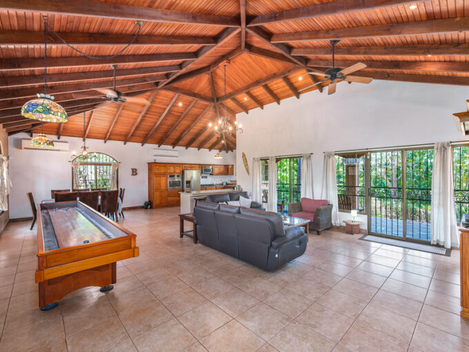 casa palacio interior showing suffleboard table and open area