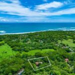 casa palacio view to ocean with beach and forrest